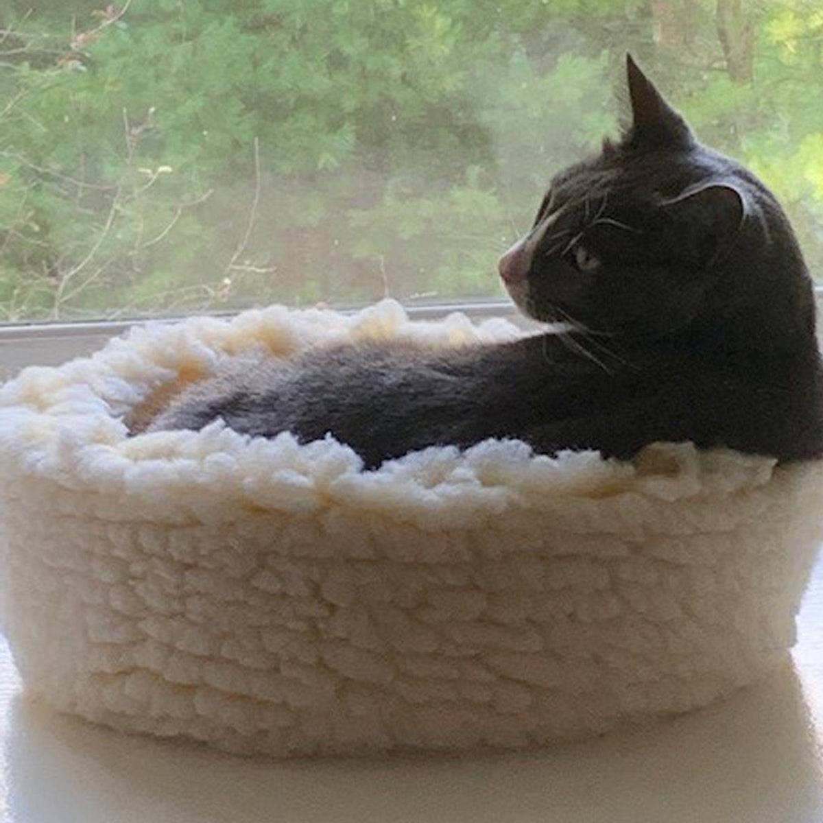 HuggleFleece HuggleSnuggler round fleece cat bed